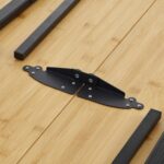 Hopfällbart campingbord i bambu med aluminiumram för utomhusbruk.
